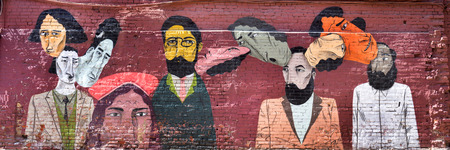 MOSCOW, RUSSIA, 02 JUNE 2015: Graffiti wall urban art many faces, made on Red October during the \\\\\\\\\\\\\\\"Artside 2014 streetart Moscow festival\\\\\\\\\\\\\\\" which took place 13-29 september 2014のeditorial素材