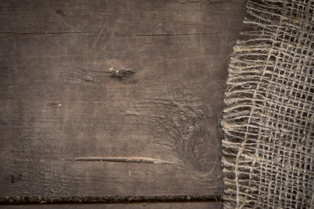 Burlap texture on wooden table backgroundの写真素材