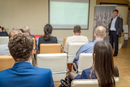 The audience listens to the acting in a conference hallの写真素材