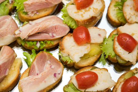 sandwiches with ham and tomatoesの写真素材