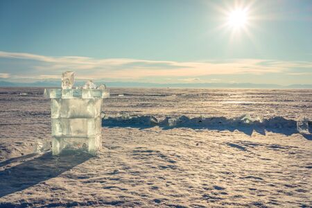 ice cube sculpture tower shape on frozen baikal lakeの写真素材