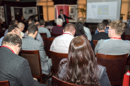The audience listens to the acting in a conference hallの写真素材