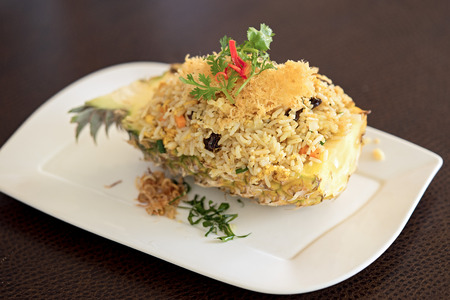 rice with seafood served in a pineappleの写真素材