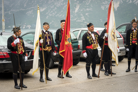 Perast, Montenegro - May 15, 2016: Shooting the Kokot (rooster) celebration. Celebrates the liberation of Perast from Turkish in 1654. Theatrical performance on a city street. Parade.のeditorial素材