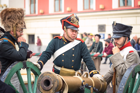 Moscow, Russia - September 11, 2016: the celebration of 869 years of the city of Moscow. Historical reconstruction - three soldiers in uniform of World War 1 era. Concept of business meetingのeditorial素材