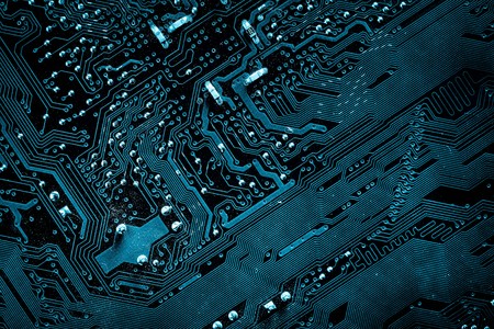 Close up of a printed blue computer circuit boardの写真素材