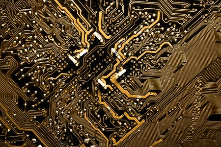 Close up of yellow computer circuit boardの写真素材