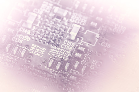 technology concept background silhouette of a computer motherboard with light colors, faded into...