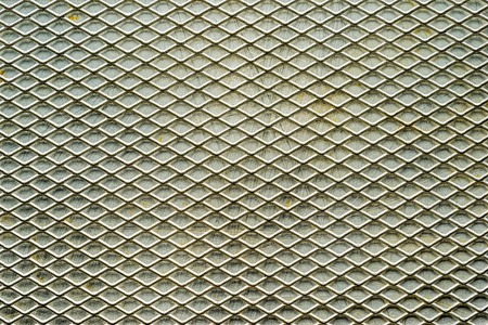 Old grey metal grate, nature metal grid for pattern industrial backgroundの写真素材