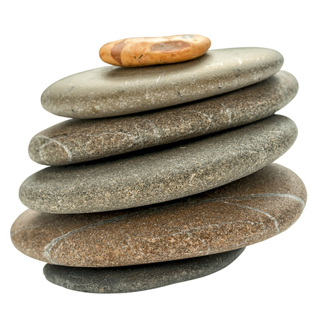 Balance stone pyramid isolated on white backgroundの写真素材