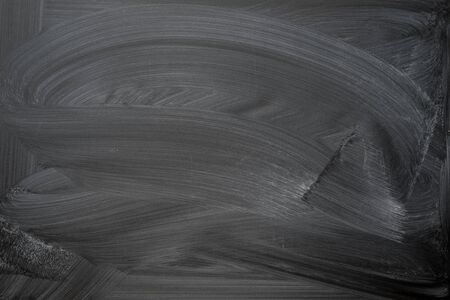 School blackboard texture erased chalkboard with spots.の写真素材