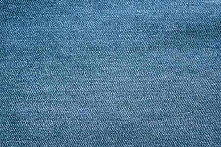 Texture of blue jeans textile close upの写真素材