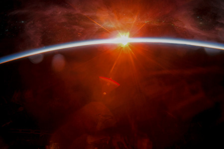 Earth with eclipse on starry sky. Abstract space sunrise .