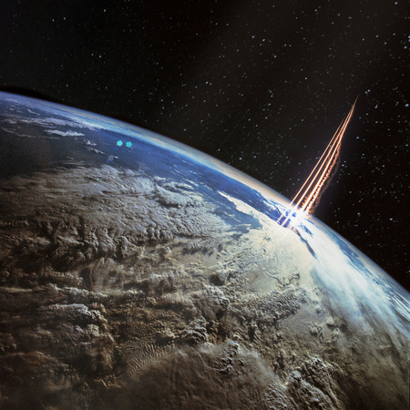 Missile launch, satellite view with planet Earth and galaxy stars.の写真素材