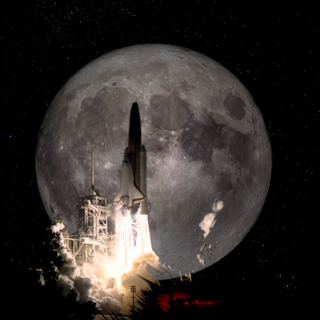 Spaceship taking off on a mission to the full moon, conceptual travel to the moon collage.の写真素材