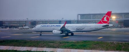 Istanbul, Turkey - April 14, 2019: Airbus A32 turkish airlines in the new international airport of Istanbul at dusk.のeditorial素材