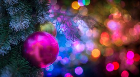 Christmass tree and many bokeh lights on the background.の写真素材