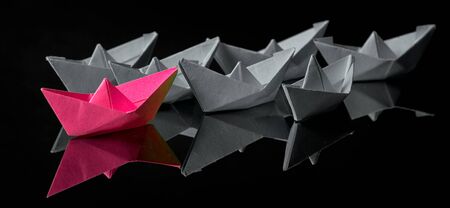 Origami paper ship with sailboats