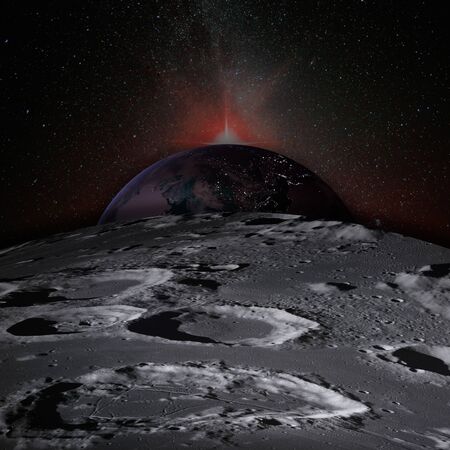 Planet Earth rises above the surface of the Moon, dotted with craters, and the sunlight behind.の写真素材