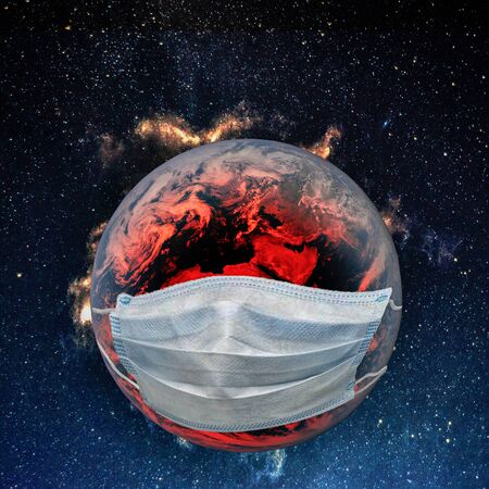 Planet Earth is sick with a virus, red with a medical mask on its face.の写真素材