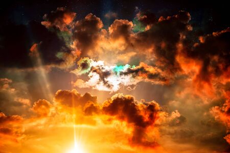 Majestic clouds in the sky and light rays.の写真素材