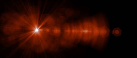 Abstract light flare special effect over black background. Sun with flare natural sunshine wallpaper.の写真素材
