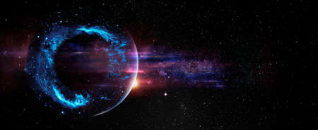Black hole over star field in outer space, abstract space wallpaper with form of letter O and sparks of light with copy space.の写真素材