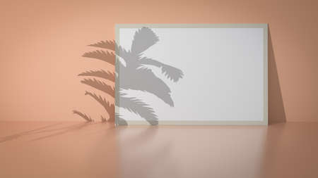 Rectangular frame background at the table near the wall with palm leaf shadow for display your projects. Blank for exhibit.の写真素材