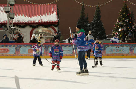 Moscow, Russia - February 20, 2022: World ice hockey champion Alexei Yashin conducts master classes at the GUM-Skating rink at the Red Square for everyone. Free public event.のeditorial素材