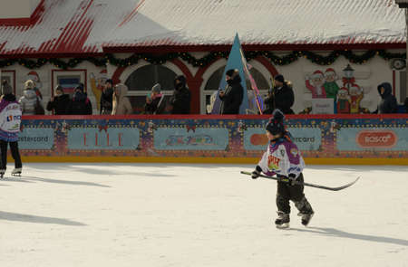Moscow, Russia - February 20, 2022: World ice hockey champion Alexei Yashin conducts master classes at the GUM-Skating rink at the Red Square for everyone. Free public event.のeditorial素材