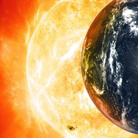Planet Earth against the backdrop of a giant Sun.の写真素材