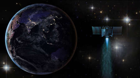 Spaceship next the planet Earth in the starry sky.の写真素材