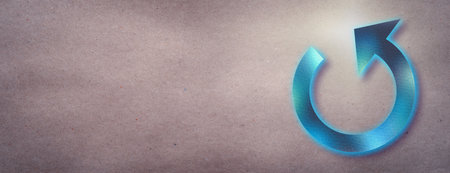 Blue neon reload arrow icon on a craft textured paper background with copy space for your text.の写真素材