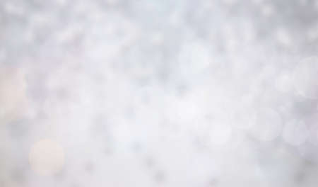 Blurred snow bokeh winter backgroundの写真素材