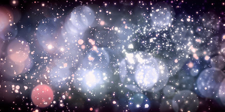 Festive background with spotted lights and snow backdropの写真素材