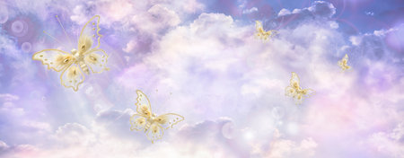 Artificial toy butterflies against the skyの写真素材