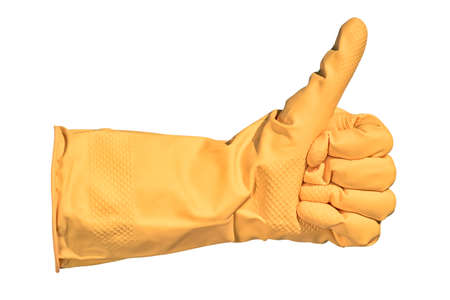 Thumbs up gesture isolated on white background. Hand in yellow gloves showing thumbs up sign.の写真素材