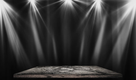 Rectangular platform podium for product presentation in the light of spotlights, on a black background.の写真素材