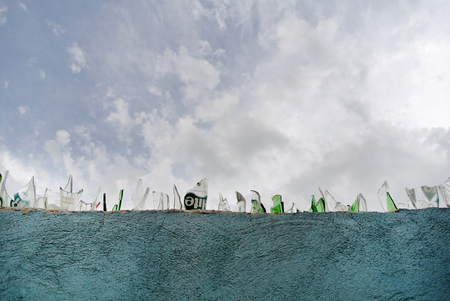 Separation Wall with broken glassの写真素材