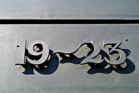 metallic numbers on the doorの写真素材