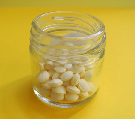 jar with pillsの写真素材