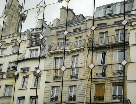 buildings reflections on mirror facade
