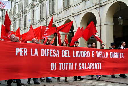 Turin, Italy - 1 May 2010: demonstration for Labor Day red flags and bannersのeditorial素材