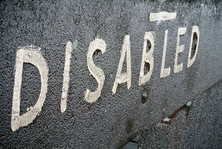 asphalt signaling of reserved space for disabled peopleの写真素材