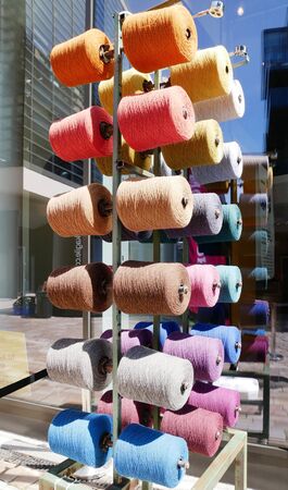 the colored coil of thread