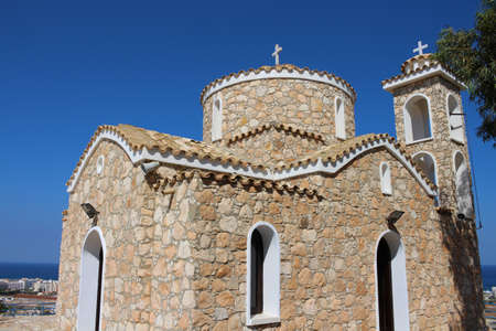 The Church of St. Elias in Protaras on the background of blue sky. Cyprus.の写真素材
