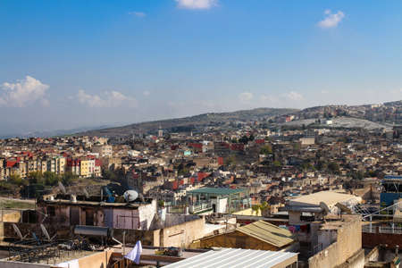 View of the roofs of Moroccan houses and Atlas mountains