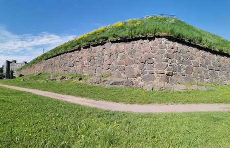 The wall of the Panzerlaks Bastion, built in the 16th century, in the city of Vyborg on a clear summer day.のeditorial素材
