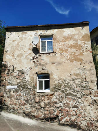 The house of a citizen, built of granite boulders, a fortress house built in the 16th century, the oldest residential building in the city of Vyborg.のeditorial素材