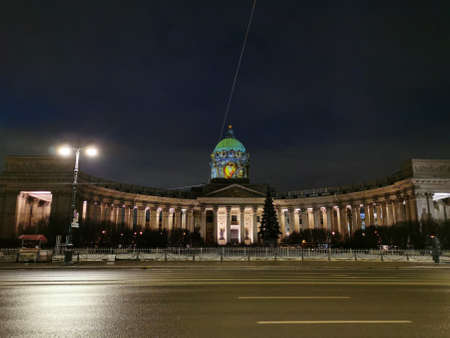 Saint Petersburg. Russia. Kazan Cathedral, view from Nevsky Prospekt in St. Petersburg, decorated for Christmas with a light projection of the Kazan Icon of the Mother of God.のeditorial素材